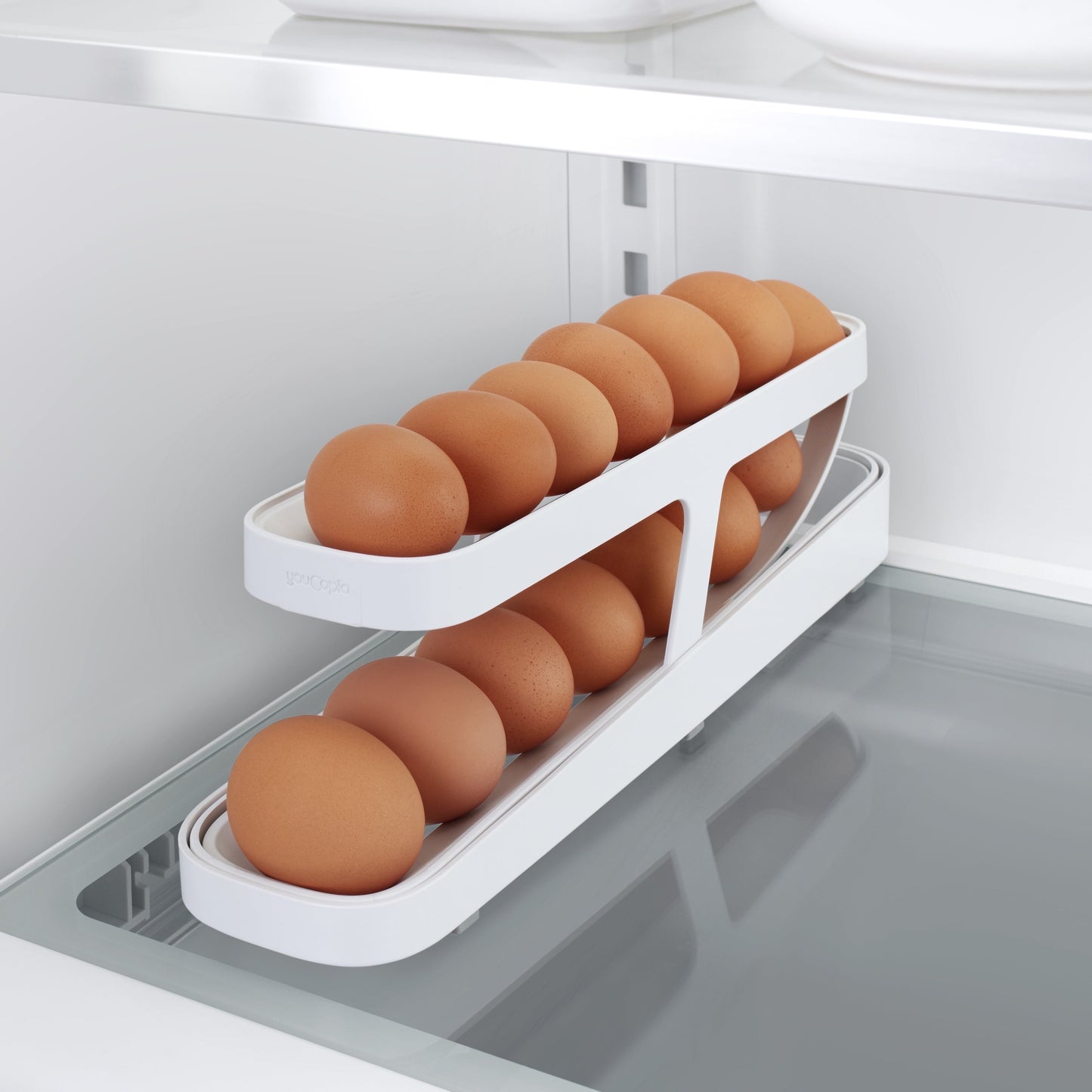 YouCopia RollDown egg dispenser, a space-saving rolling organizer for fridge