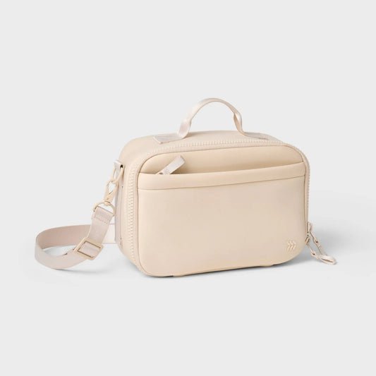 Cream faux neoprene lunch tote with zipper closure and adjustable strap