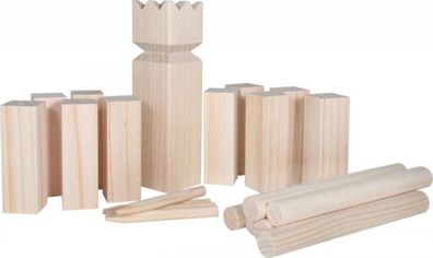 A set of traditional wooden Kubb game pieces arranged on a grassy outdoor field