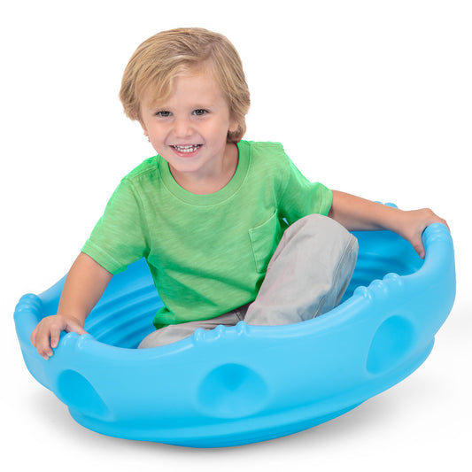 Simplay3 Wobble Disk in blue, a large outdoor toy for kids to climb and jump