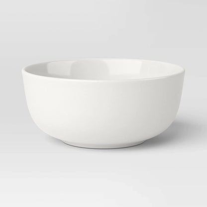 12-piece porcelain dinnerware set with round rim design from Threshold