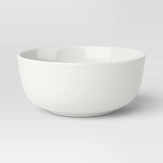12-piece porcelain dinnerware set with round rim design from Threshold