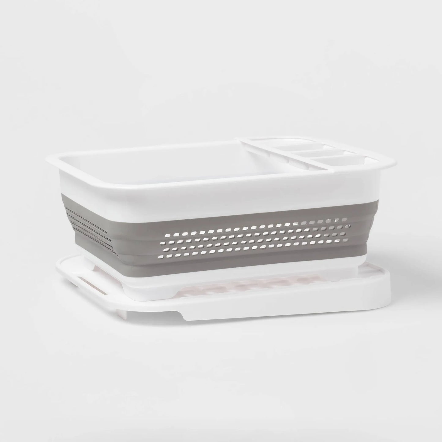 Plastic collapsible dish rack with drip tray by Brightroom, white color, rectangular silhouette with slots for dishes and sil
