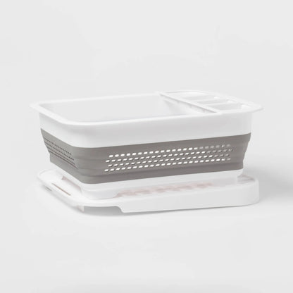 Plastic collapsible dish rack with drip tray by Brightroom, white color, rectangular silhouette with slots for dishes and sil