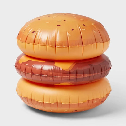 Oversized burger-shaped pool float in bright colors for lounging in the pool, lake, or beach.