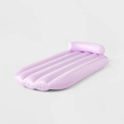 Sun Squad pool float with a pillow for added comfort while lounging in the water