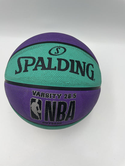 Spalding NBA Varsity 28.5 outdoor basketball with teal and purple Charlotte Hornets design