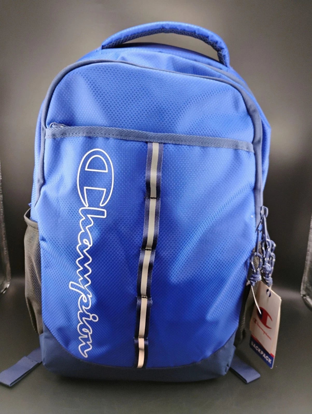 Champion Youth Blue Logo Backpack with padded straps and mesh pockets