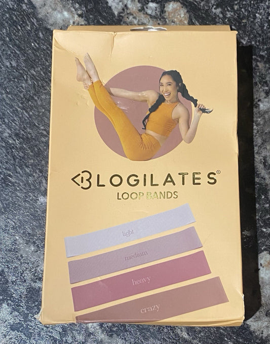 Set of four colorful Blogilates Loop Bands made of durable rubber for various fitness routines